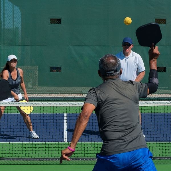 Couples playing pickleball on the Tesoro Club courts