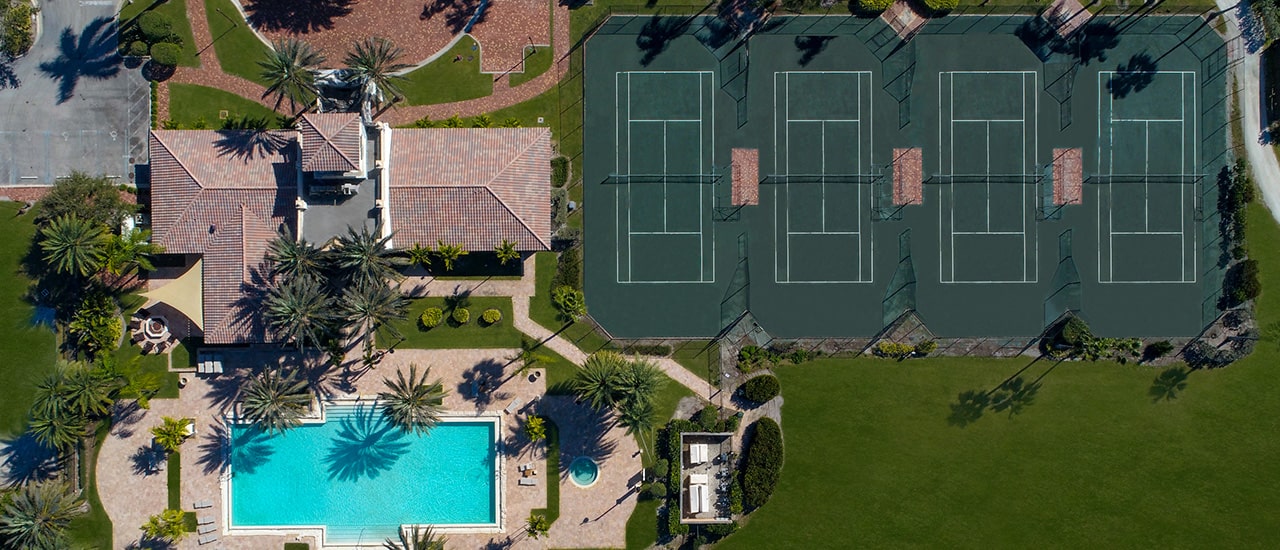 tennis courts and pool at tesoro club