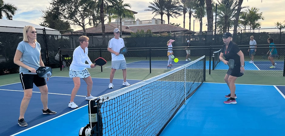 friends playing pickleball game