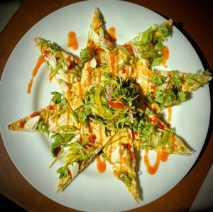 Asian Sesame Crab Rangoon Flatbread dining at tesoro