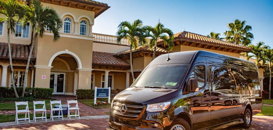 Luxury sprinter vans stand ready to whisk guests throughout the community during the 2nd Annual Taste of Tesoro.